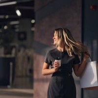 carefree businesswoman enjoying in shopping mall. - fashion stock pictures, royalty-free photos & images
