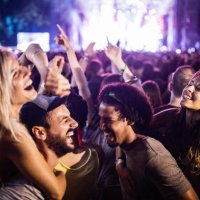 carefree couples having fun while dancing on music festival. - concert stock pictures, royalty-free photos & images