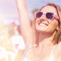 carefree woman loving the color festival - concert stock pictures, royalty-free photos & images