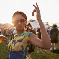 carefree young woman puckering and dancing - concert stock pictures, royalty-free photos & images