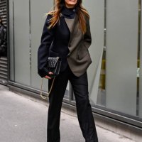 Caroline de Maigret is seen wearing a Sacai jacket, black pants black leather shoes and black bag outside the Sacai show during Womenswear...