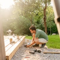 carpenter installing decking boards - home decoration stock pictures, royalty-free photos & images