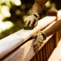 carpenter sanding cedar deck - home decoration stock pictures, royalty-free photos & images