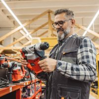 carpenter shopping in hardware store. - home decoration stock pictures, royalty-free photos & images