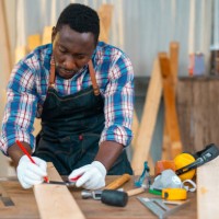 carpenter working on planks at the workshop - home decoration stock pictures, royalty-free photos & images