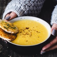 carrot pumpkin cream soup with garlic bread - food stock pictures, royalty-free photos & images