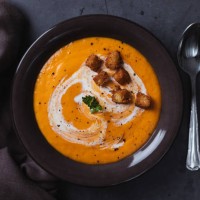 carrot soup with cream and croutons - home decoration stock pictures, royalty-free photos & images