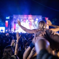carrying a woman on music festival! - concert stock pictures, royalty-free photos & images