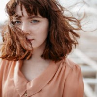 caucasian woman walking near the sea - fashion stock pictures, royalty-free photos & images