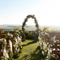 chairs decorated with flower near wedding altar - garden decoration stock pictures, royalty-free photos & images