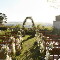chairs decorated with flowers arranged near wedding altar - garden decoration stock pictures, royalty-free photos & images