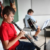 chamber music class by clarinet and guitar student - concert stock pictures, royalty-free photos & images