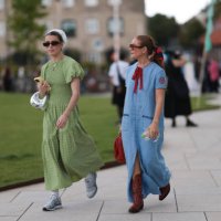 Charlotte Olivia Crocket is seen wearing a large white scrunchie in her hair, rectangular tortoise brown sunglasses from Corlin Eyewear, chunky...