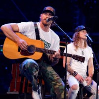 Chase Rice performs onstage at the Concert For Carolina Benefit Concert at Bank of America Stadium on October 26, 2024 in Charlotte, North Carolina.