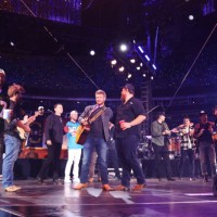 Chase Rice, Scotty McCreery, Bailey Zimmerman, Luke Combs, Wesko, Bob Crawford and Scott Avett of The Avett Brothers and Eric Church perform onstage...