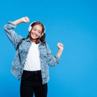 cheerful female high school student listening to music - fashion stock pictures, royalty-free photos & images