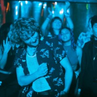 cheerful multiracial male and female friends enjoying while dancing in club - concert stock pictures, royalty-free photos & images