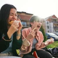 cheerful outdoor lunch - junk food stock pictures, royalty-free photos & images