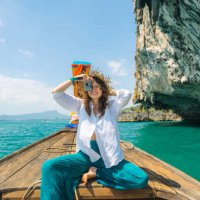 cheerful woman traveling with thai taxi boat and photographing with point and shoot camera - travel stock pictures, royalty-free photos & images