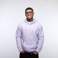 cheerful young man wearing lilac hoodie - fashion stock pictures, royalty-free photos & images