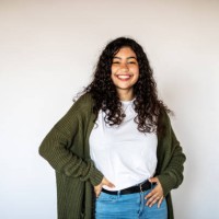 cheerful young woman standing on white background - fashion stock pictures, royalty-free photos & images