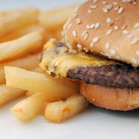 cheeseburger closeup - junk food stock pictures, royalty-free photos & images