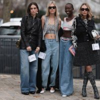 Chiara Baratello wears black skirt, vest, white bag & Linda Tol wears denim jeans, grey cropped top, vest & Erika Boldrin wears black jacket, denim...