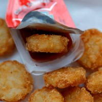 Chick-fil-A hash brown sits in a packet of Heinz ketchup on April 12, 2021 in Novato, California. Packets of ketchup are in short supply as takeout...