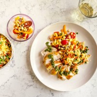 chicken breast, fried rice, and salad on a plate on white, marble background - food stock pictures, royalty-free photos & images
