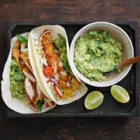 chicken taco with guacamole and mixed vegetables - junk food stock pictures, royalty-free photos & images