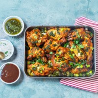 chicken wings in salsa verde - junk food stock pictures, royalty-free photos & images
