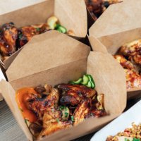 chicken wings packed to take away - junk food stock pictures, royalty-free photos & images