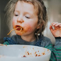 child eating spaghetti - food stock pictures, royalty-free photos & images