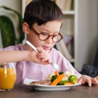 child eating vegetables - food stock pictures, royalty-free photos & images