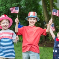 children celebrating independence day together - garden decoration stock pictures, royalty-free photos & images