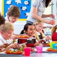 children eating school dinners - food stock pictures, royalty-free photos & images