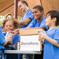 children's sports team charity drive for donations, local disaster relief. - food stock pictures, royalty-free photos & images