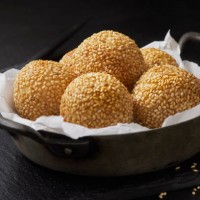chinese sesame balls with red bean paste - junk food stock pictures, royalty-free photos & images