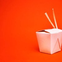 chinese takeout container with chopsticks, isolated on red - junk food stock pictures, royalty-free photos & images