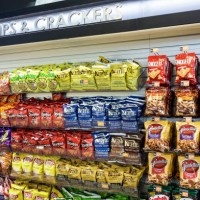 Chips and crackers display in a convenience store at Fort Drum Service Plaza.