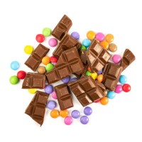chocolate and coloured candy - junk food stock pictures, royalty-free photos & images