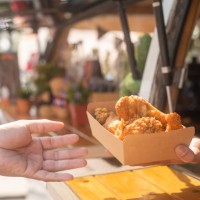 choosing and buying different types of fast food in eat market - junk food stock pictures, royalty-free photos & images