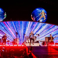 Chris Martin and Jonny Buckland , Guy Berryman and Will Champion of the band Coldplay perform at Stadio Diego Armando Maradona on June 21, 2023 in...