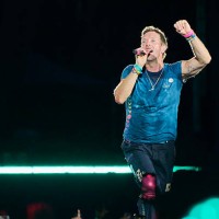 Chris Martin of Coldplay performs at Rogers Stadium on July 07, 2025 in Toronto, Ontario.