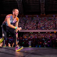 Chris Martin of the band Coldplay perform at Stadio Diego Armando Maradona on June 21, 2023 in Naples, Italy.