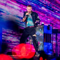 Chris Martin of the group Coldplay Performs at Stadio Olimpico on July 12, 2024 in Rome, Italy.