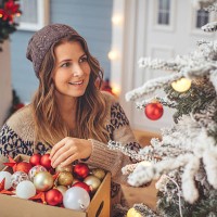 christmas decorating. - garden decoration stock pictures, royalty-free photos & images