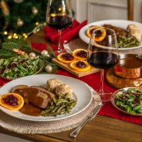 christmas dinner roast beef venison with gravy and cranberries in rustic kitchen home - food stock pictures, royalty-free photos & images