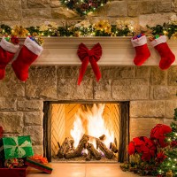 christmas fireplace, tree, stockings, fire, hearth, lights, and decorations - home decoration stock pictures, royalty-free photos & images