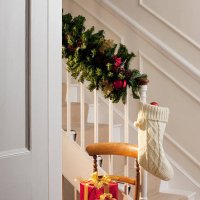 christmas gifts and stocking near staircase - home decoration stock pictures, royalty-free photos & images